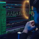 Person reviewing log data on a computer monitor
